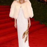 Madame Vogue Anna Wintour in a Prada update of Elsa Schiaparelli's famous lobster-embellished dress
